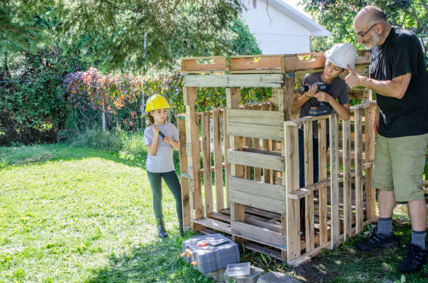 istock Two kids building a wooden shack 1176312856