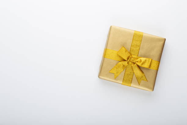 istock Gift or present box and stars confetti on color table top view. Flat lay composition for birthday, mother day or wedding. 1176313162