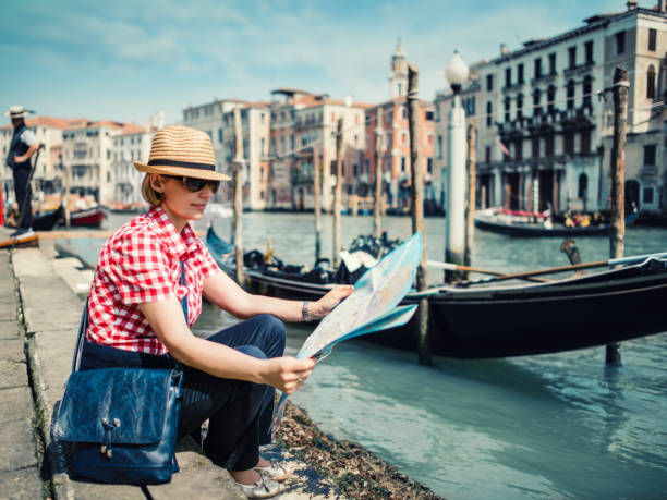 istock Tourist woman with map in Venice 1176317478