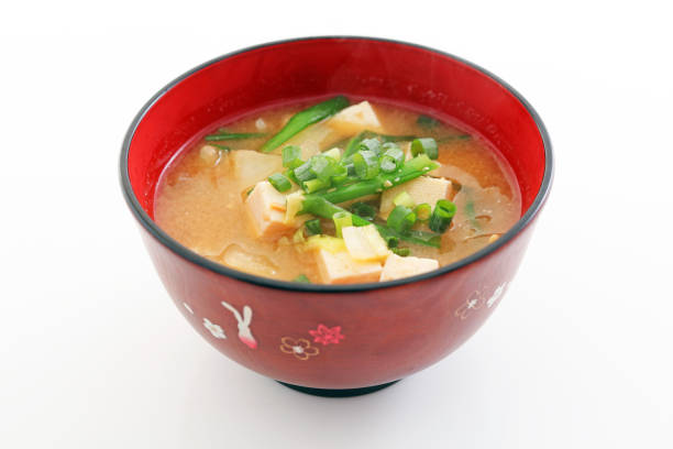 A bowl of miso soup isolated on white background