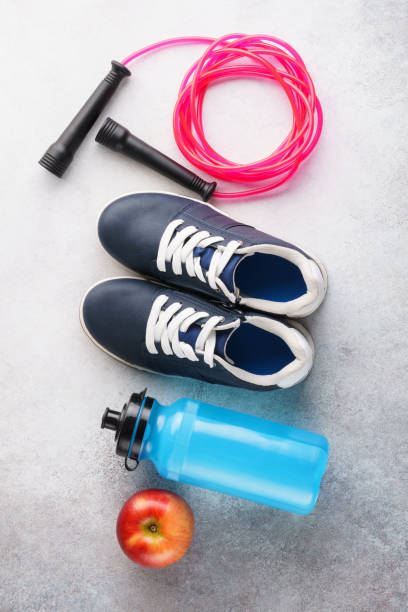 istock Fitness background with various sport equipment. Flat lay. 1176325308