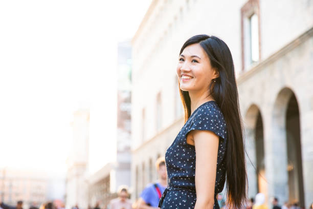 istock Smiling Chinese tourist girl 1176325893