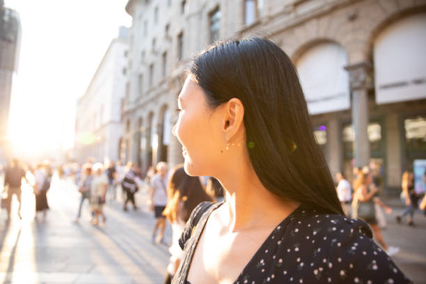 istock Smiling Chinese tourist girl 1176325983