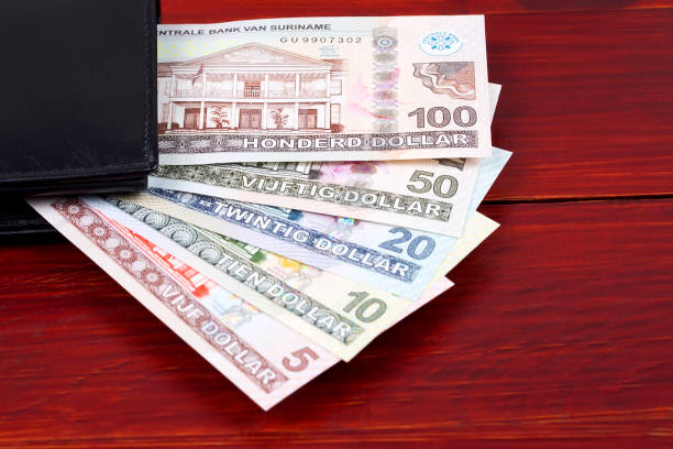 istock Surinamese Dollar in the black wallet 1176326129