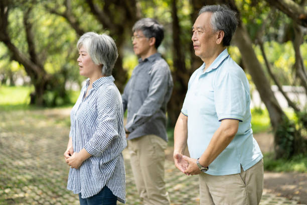 istock Asian family practicing in park 1176327972