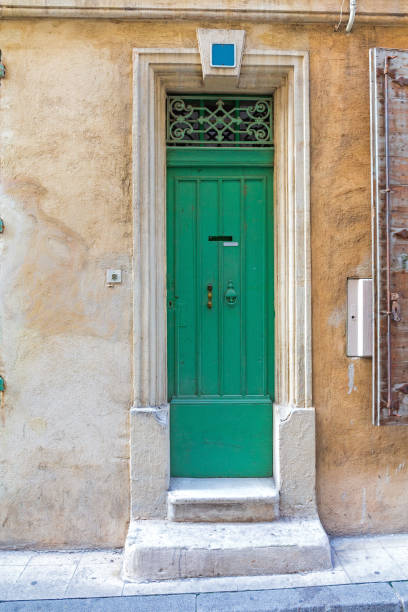 istock Narrow Green Door 1176328166