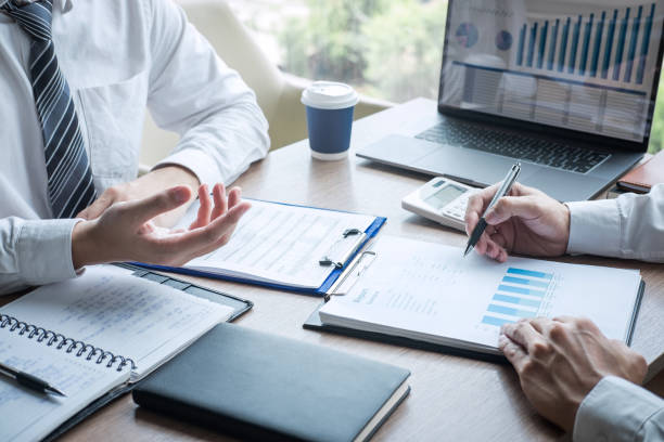 istock Professional executive manager, Business partner discussing ideas marketing plan and presentation project of investment at meeting and analyzing on document data, financial and investment concept 1176329677