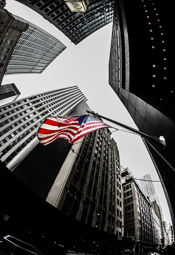New York Wall Street and Stars and Stripes. Shooting Location: Manhattan, New York