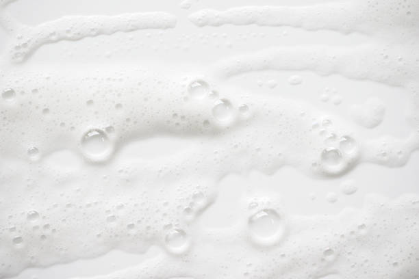 Abstract background white soapy foam texture. Shampoo foam with bubbles Abstract background white soapy foam texture. Shampoo foam with bubbles soap sud photos stock pictures, royalty-free photos & images