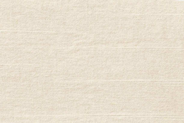 beige stoff hintergrund - canvas cotton textured textile stock-fotos und bilder