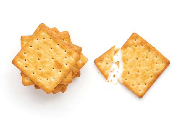 istock Crushed dry cracker cookies isolated on white background. 1176336681
