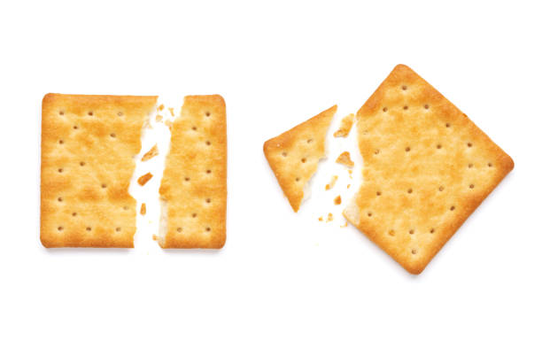 istock Crushed dry cracker cookies isolated on white background. 1176336682