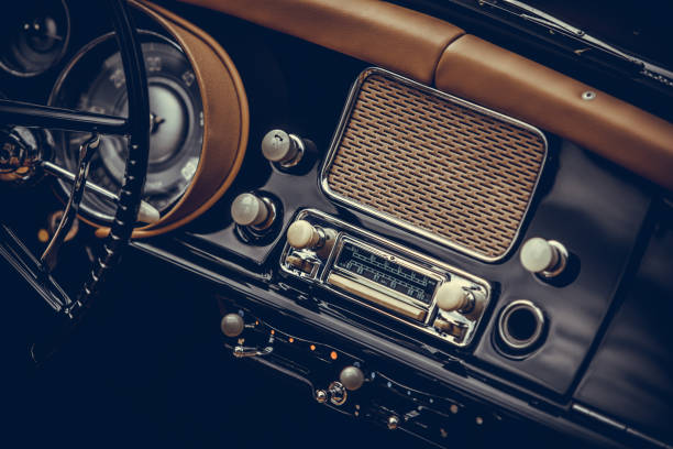 Classic vintage car stereo Close up shot of a classic vintage car stereo on the dashboard. stereo photos stock pictures, royalty-free photos & images
