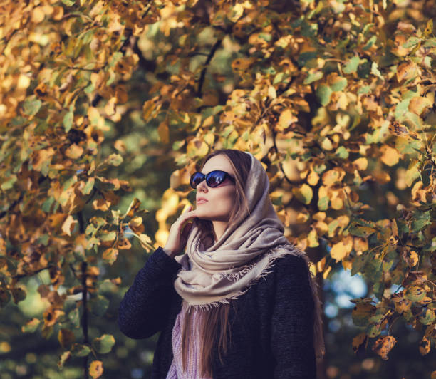 istock glamorous lady in autumn coat 1176344498