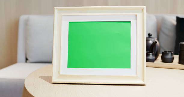 close up of photo frame close up of photo frame with green copys space on table at home chroma key photos stock pictures, royalty-free photos & images