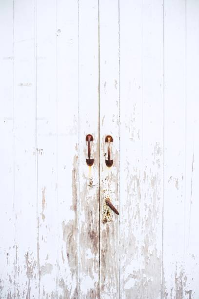 istock Old vitage wooden White Door with old latch handle 1176353916