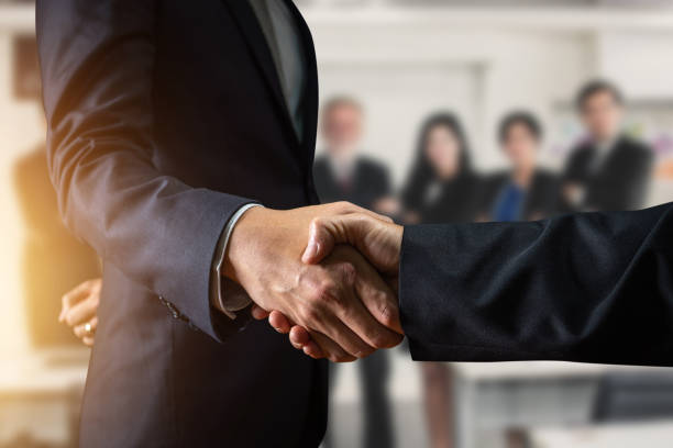 istock Success business, successful agreement negotiation and confident  partner cooperation concept, Businessman shake hands with customer 1176356908