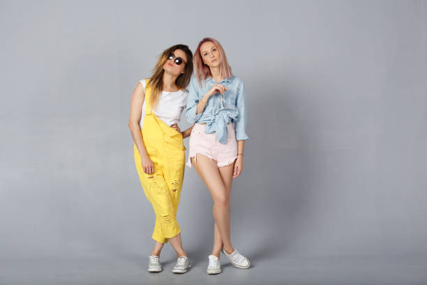 istock The concept of stylish beautiful young girlfriends 1176357110