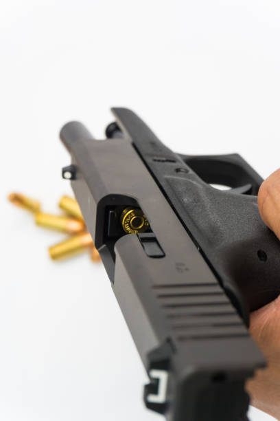 istock 9mm conceal gun with full metal jacket bullet 1176364105