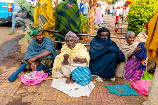 BAHIR DAR, ETHIOPIA, APRIL 21th. 2019, Begging people on the street on Easter holidays. April 21th. 2019, Bahir Dar, Etiopia