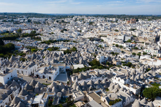 The Rooftops Italian Town This aerial photo was taken over the breathtaking Alberobello city with this unique architecture and rooftops, South Italy. alberobello stock pictures, royalty-free photos & images