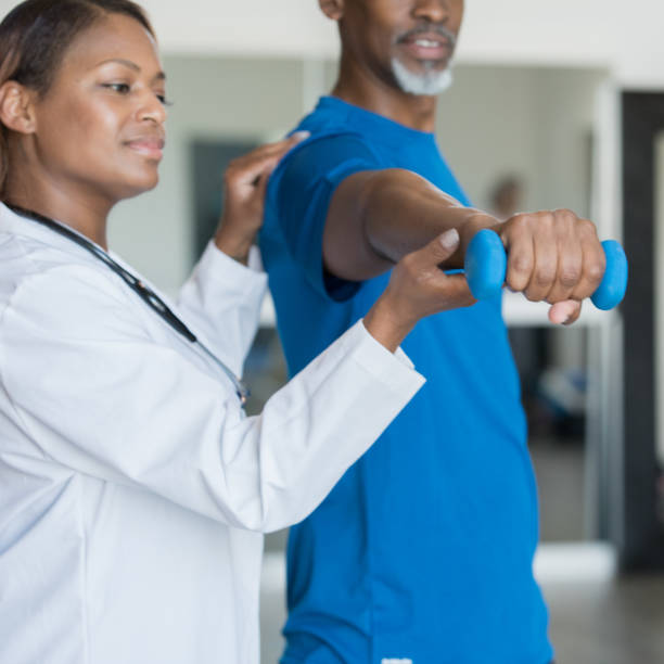 istock Senior male working on wrist strength at physical therapy 1176370791