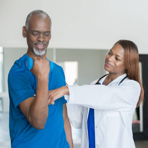istock Doctor helping senior male 1176370798