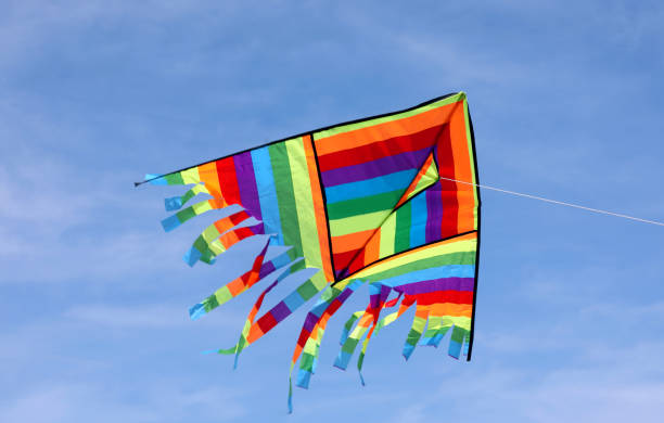 istock Multicolors kite flying on the blue sky 1176374226