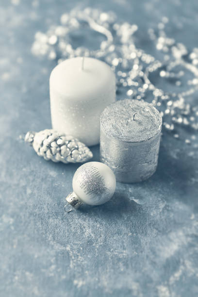 istock Christmas candle with ornaments on gray background. Copy space. Close-up 1176379972