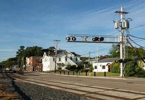 Small town along railroad tracks on a late summer morning