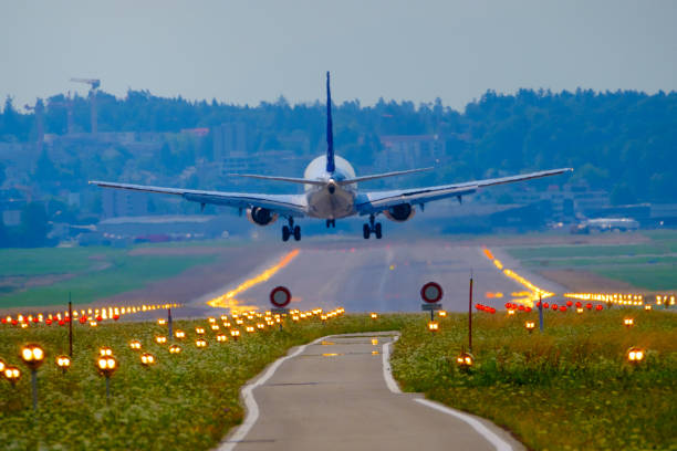 istock Airplane landing at airport runway 1176387281