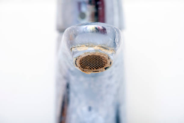 Close-up Dirty Faucet with limescale. Sink Faucet with Rust. Close-up Dirty Faucet with limescale. Sink Faucet with Rust. toughness stock pictures, royalty-free photos & images
