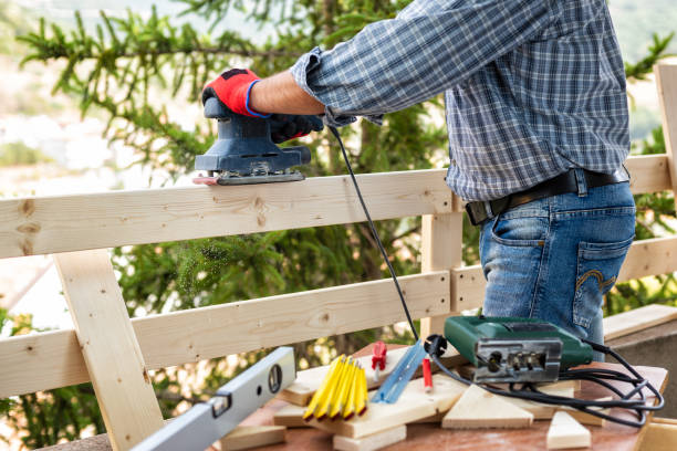 istock Craftsman at work on wooden boards. 1176391057