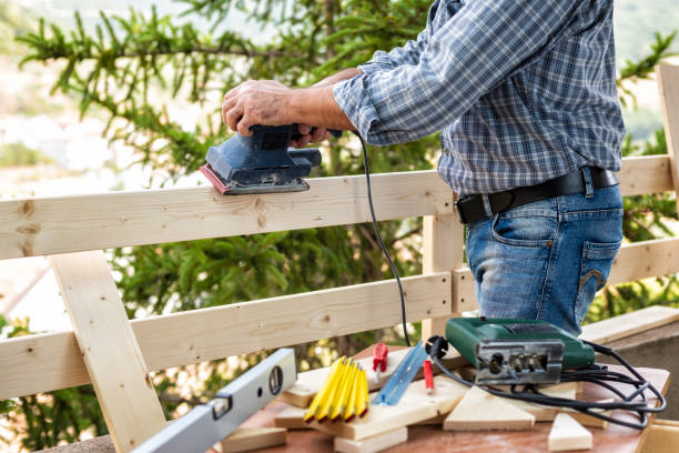istock Craftsman at work on wooden boards. 1176391073