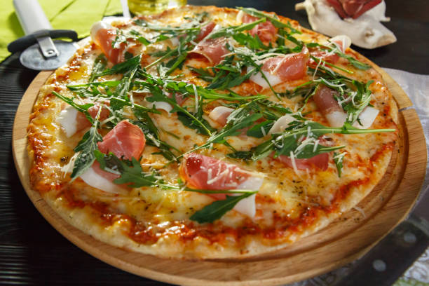 istock Pizza with bacon, cheese and herbs 1176395291