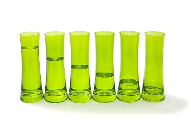 Group of glasses filled with water stock photo