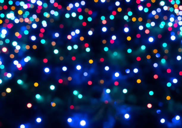 istock Abstract colorful bokeh texture on dark background 1176398555