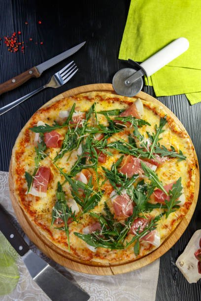 istock Pizza with bacon, cheese and herbs 1176398715
