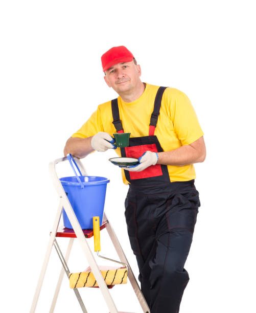 istock Worker on ladder with cup of tea. 1176402278