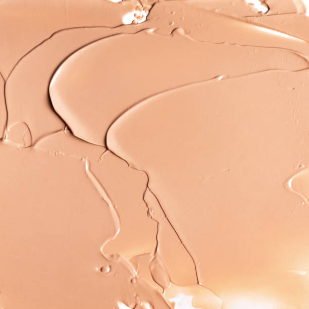 istock Beige texture of makeup smear background. 1176402457