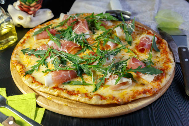 istock Pizza with bacon, cheese and herbs 1176402518