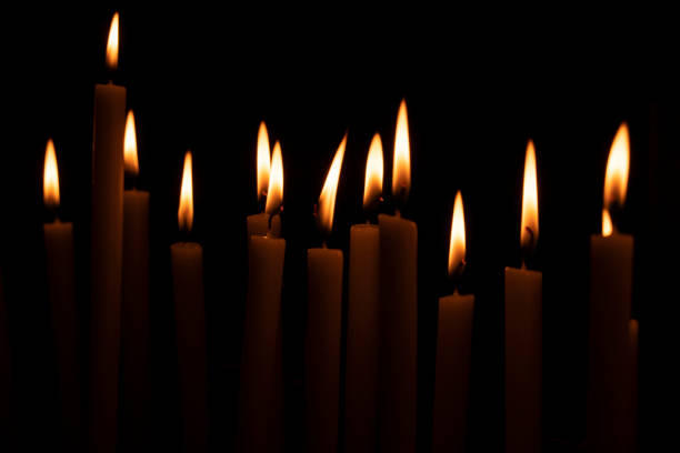 istock votive candles lit in a church 1176411671