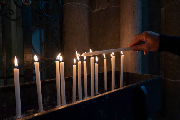 istock votive candles lit in a church 1176411796