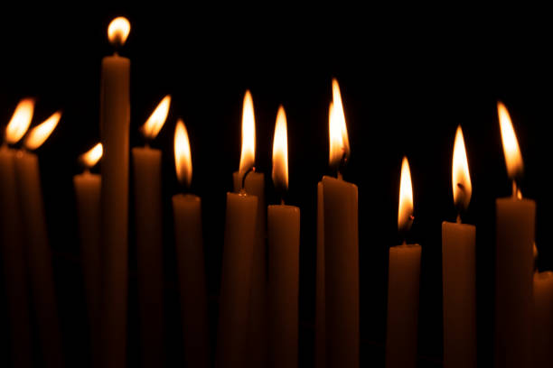 istock votive candles lit in a church 1176411861