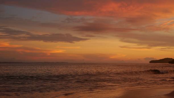 Amazing sunset on the beach Playa Cacique of Contadora island in the Pacific Ocean Archipelago Las Perlas in the Pacific ocean isla contadora stock pictures, royalty-free photos & images