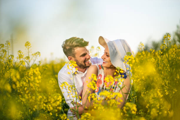 istock Happy young couple enjoying in nature 1176414133