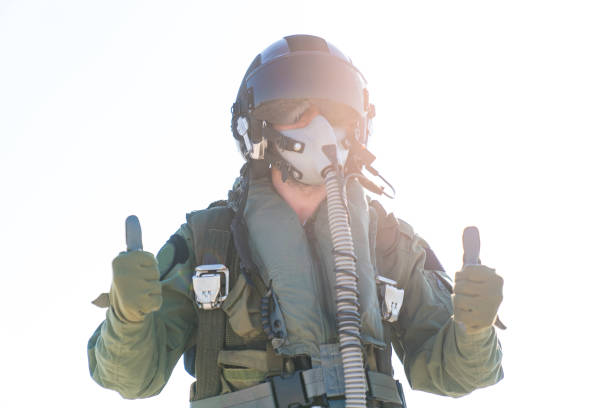 istock Pilot with suit and military air. Fighter pilot portrait posing 1176422860