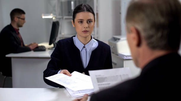 istock Serious female manager presenting annual report to company CEO, analytics 1176426629