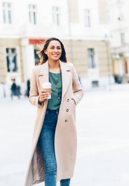 istock Woman walking on the street 1176428237