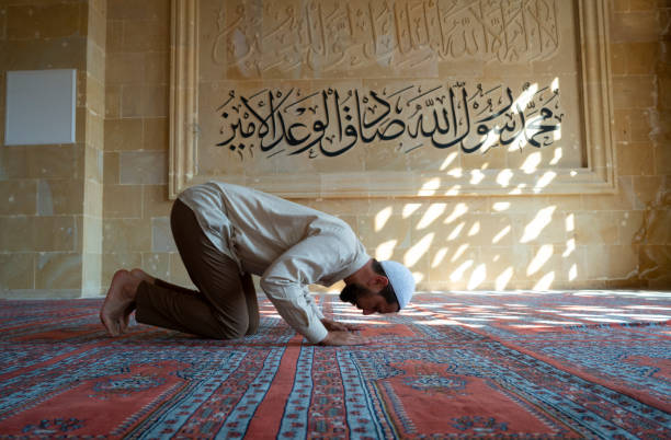 istock Muslim man praying in mosque 1176429351